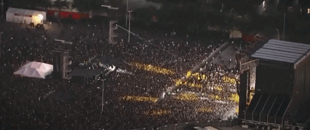 Large festival crowd at night, from the interview with SRMC security consultant Paul S. Denton on the Astroworld crowd safety incident