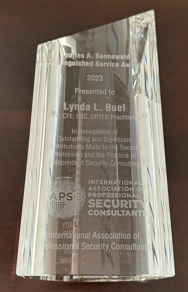 Charles A. Sennewald Distinguished Service Award, 2023, presented to Lynda L. Buel by the International Association of Professional Security Consultants