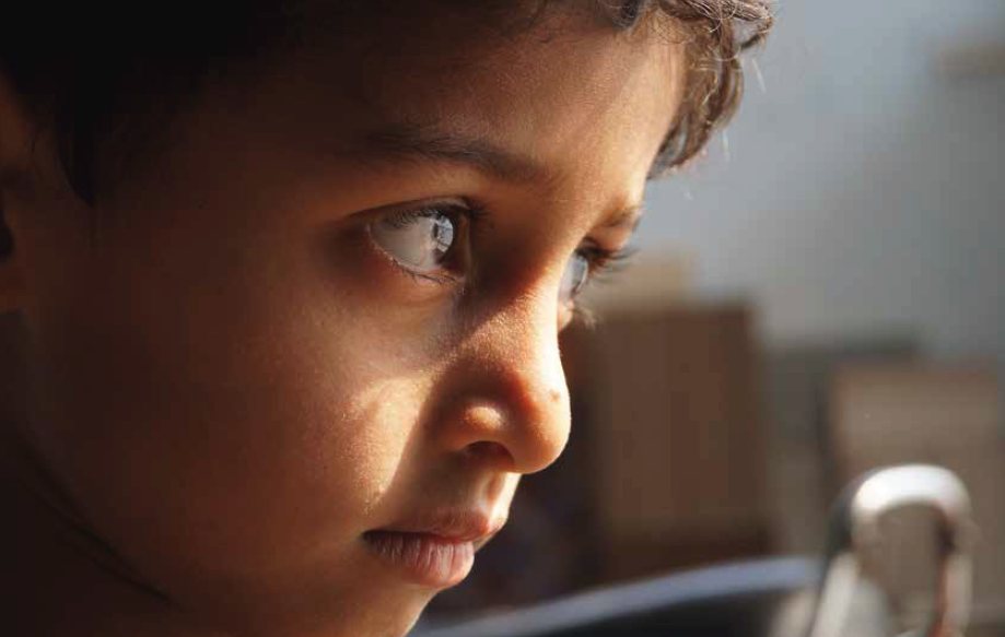 Close-up of a young child, from the Region VII Head Start Sand Box magazine article on school violence that mentions SRMC